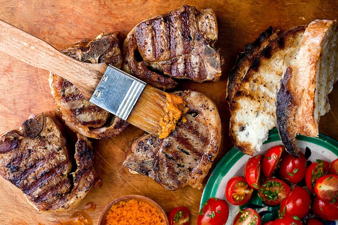 Grilled Lamb Chops with Tomato Salad and Bread; Basting Sauce and Brush
