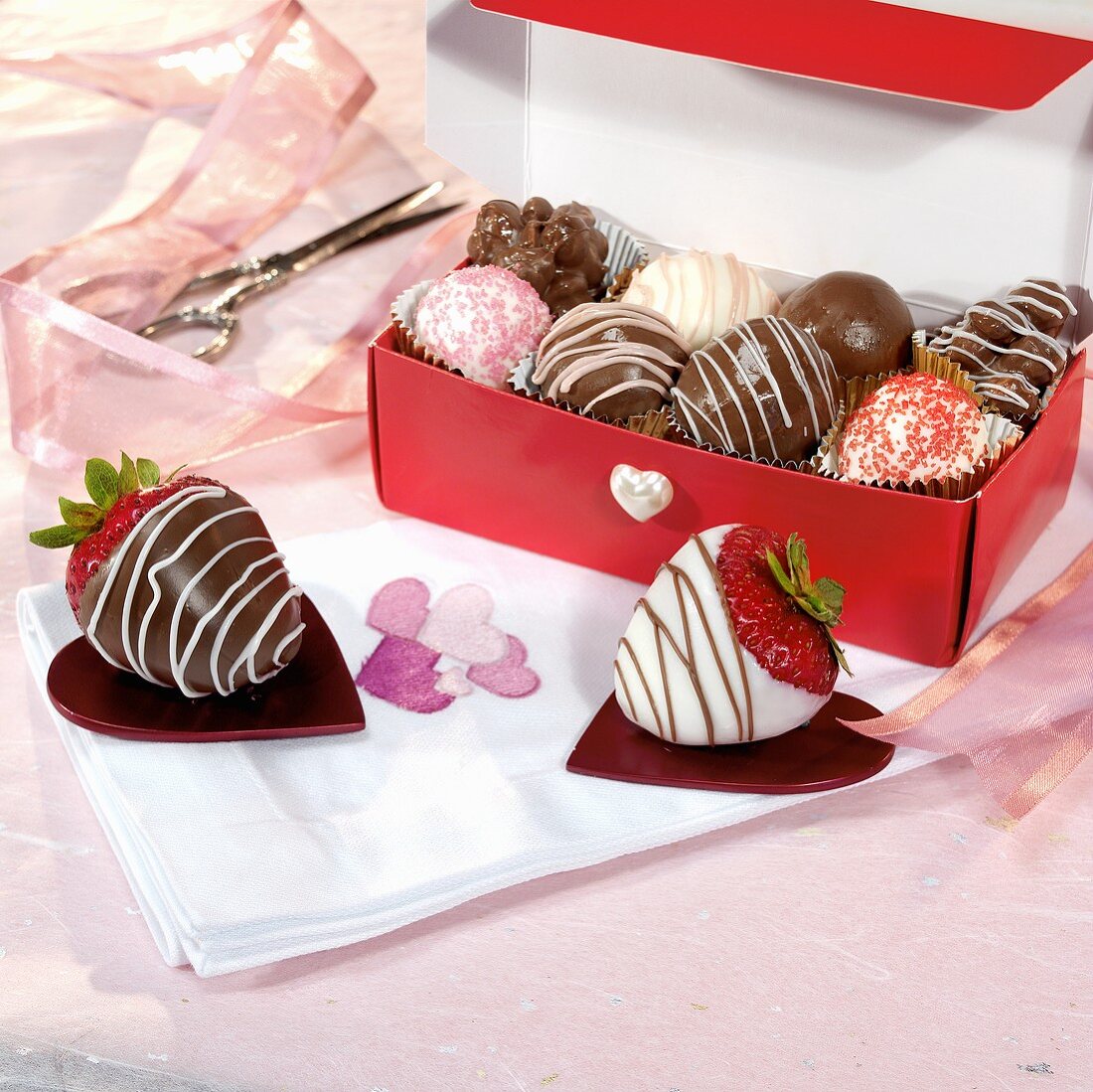 Two Chocolate Covered Strawberries; Box of Chocolates