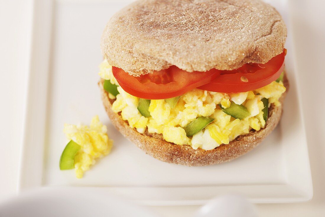 Breakfast Sandwich; Scrambled Eggs with Peppers and Tomato on English Muffin