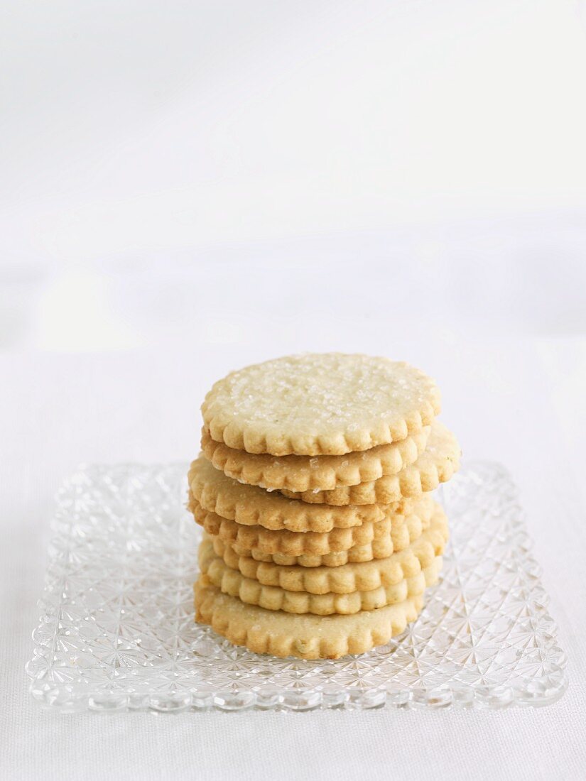 Stacked Butter Cookies on a Glass Plate
