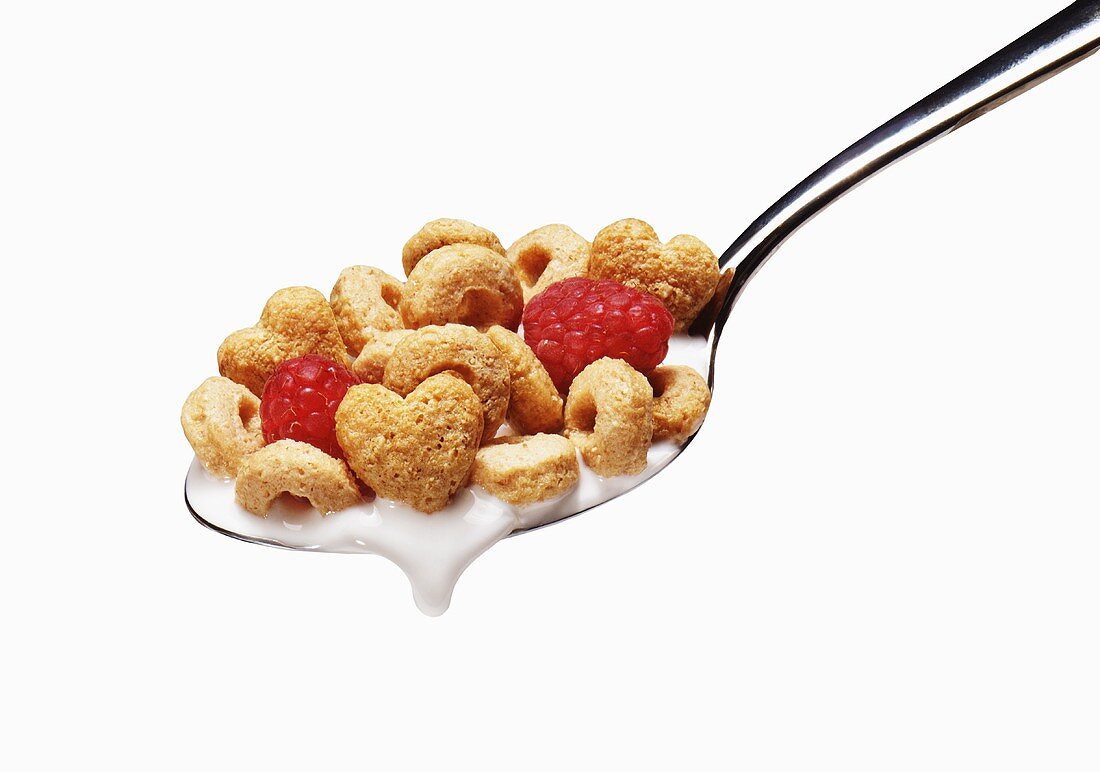Spoonful of Oat Cereal with Raspberries; White Background