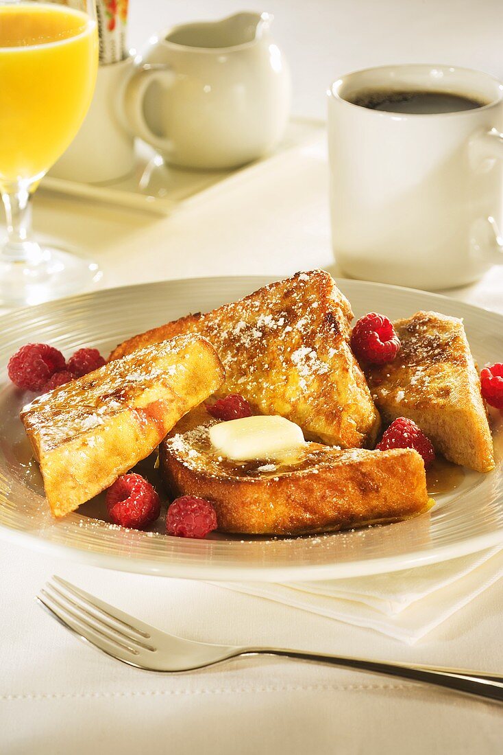 French Toast with Raspberries and Butter; Cup of Coffee