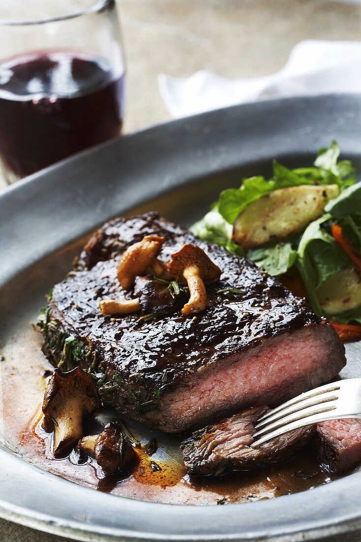 Steak with Chanterelles; Sliced with Fork; Side Salad