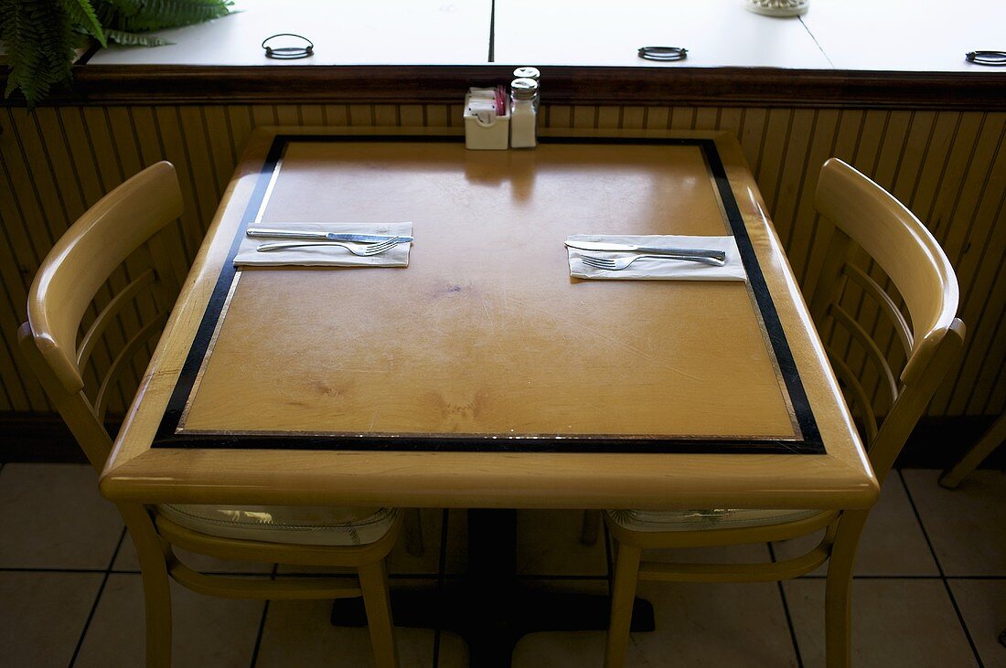 Diner Table Set with Napkins and Silverware; Salt, Pepper and Sugar