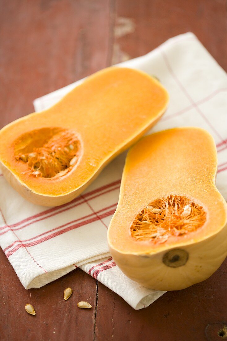 Butternut Squash Halved on a Dish Towel