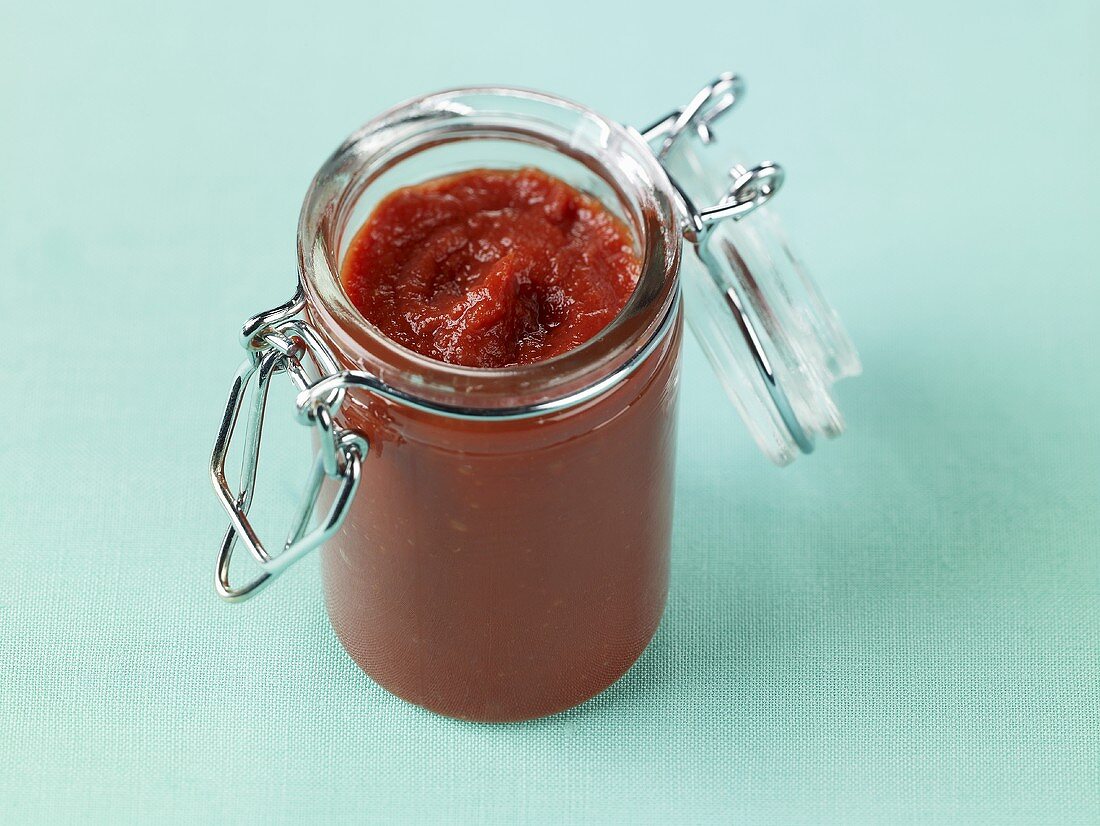 Tomato Paste in a Small Glass Canister