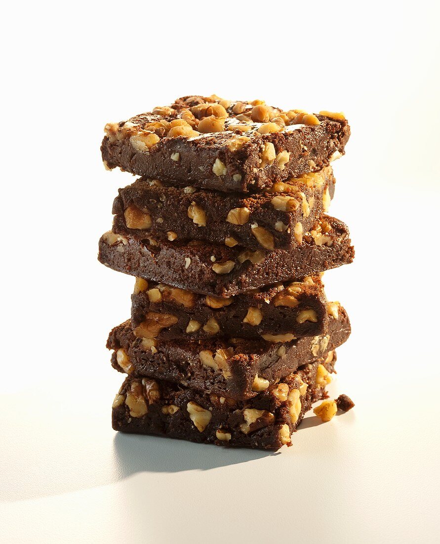 Chocolate Nut Brownies; Stacked on White Background