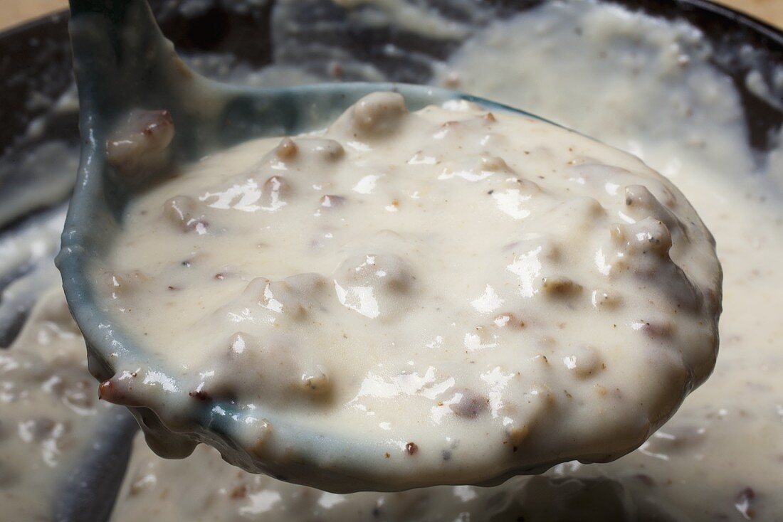 White Cream Gravy Ready to Be Ladled Over Biscuits