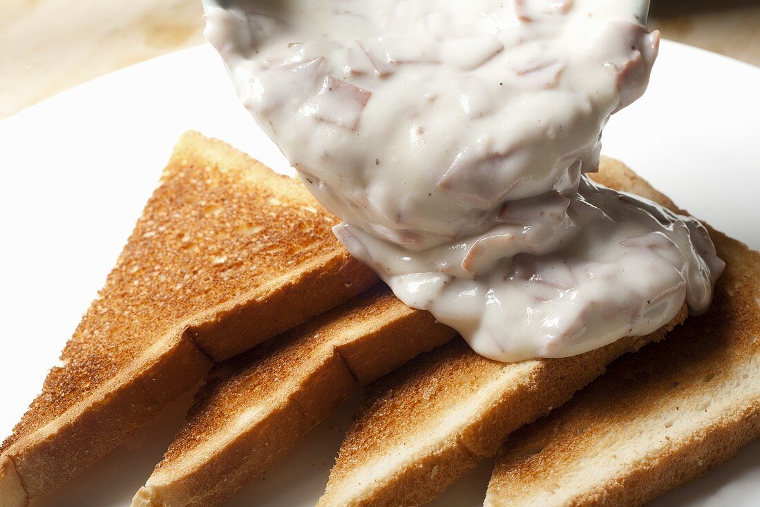 Pouring Creamed Chipped Beef on Toast