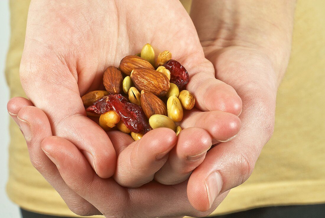 Hands Holding Trail Mix
