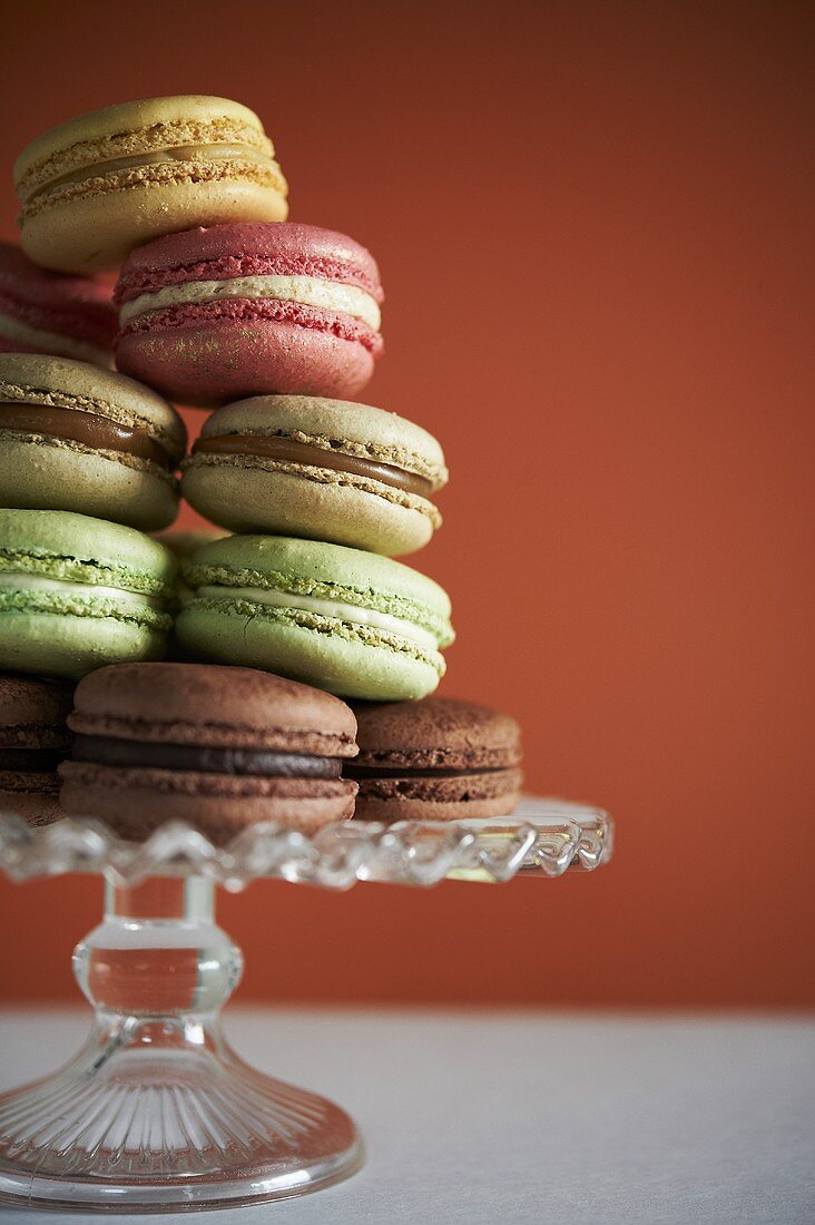 Various Flavors of Macaroons on a Glass Pedestal Dish