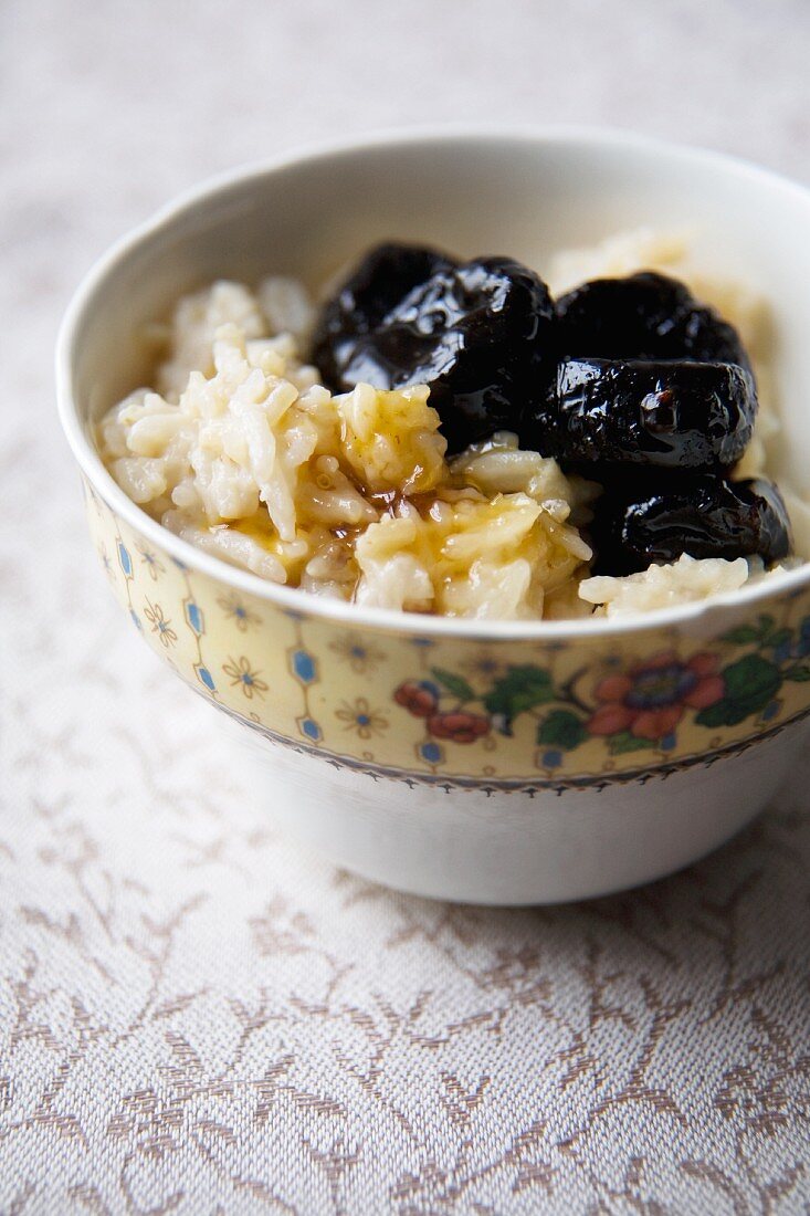 Bowl of Rice Pudding with Prunes