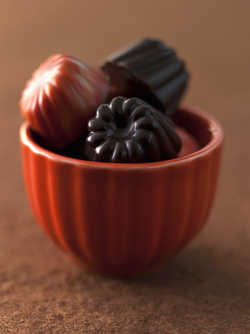 Caramel and Chocolate Truffles in a Small Orange Bowl from Bakery Nouveau in Seattle Washington