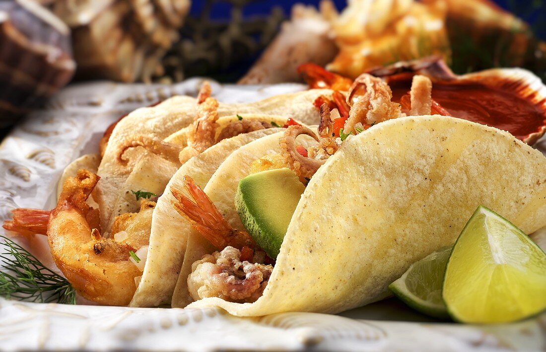 Fried Seafood Tacos in Corn Tortillas; Lime Wedges