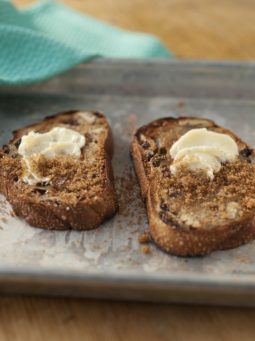 Two Slices of Cinnamon Raisin Toast with Butter