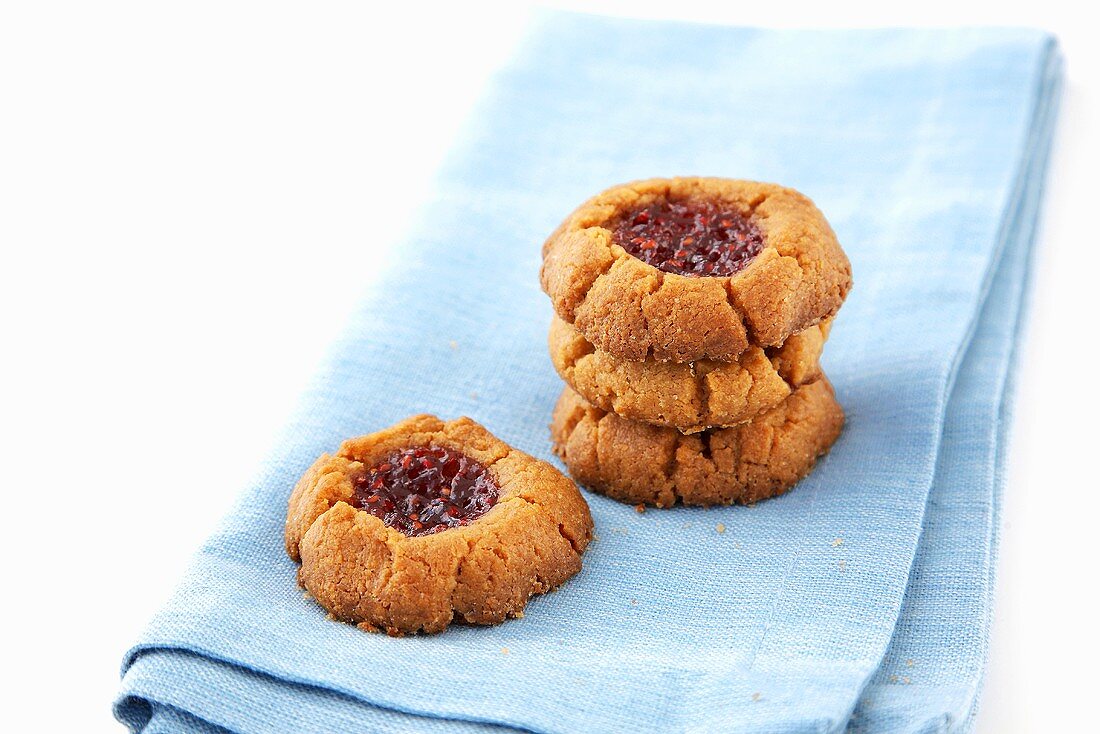 Peanut Butter and Jelly Cookies on a Blue Napkin