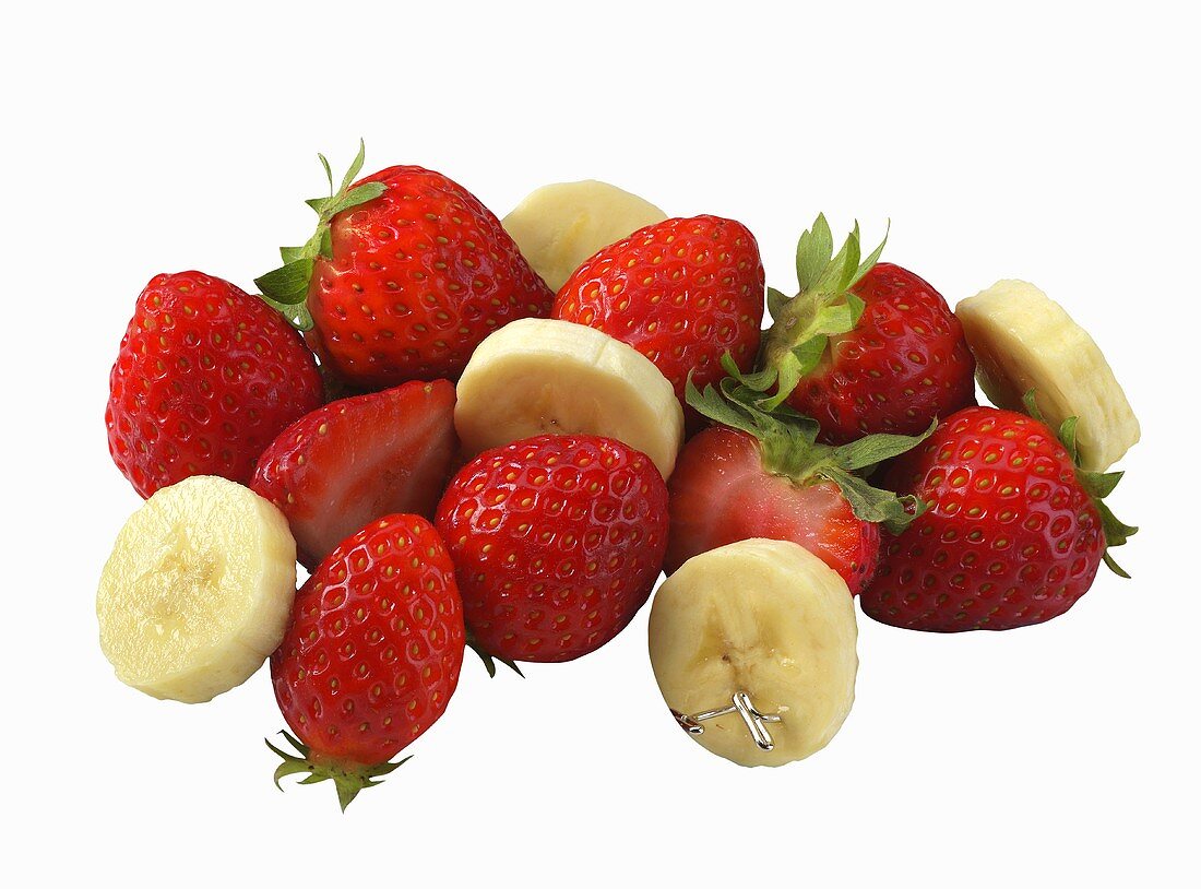 Strawberries and Banana Slices on a White Background