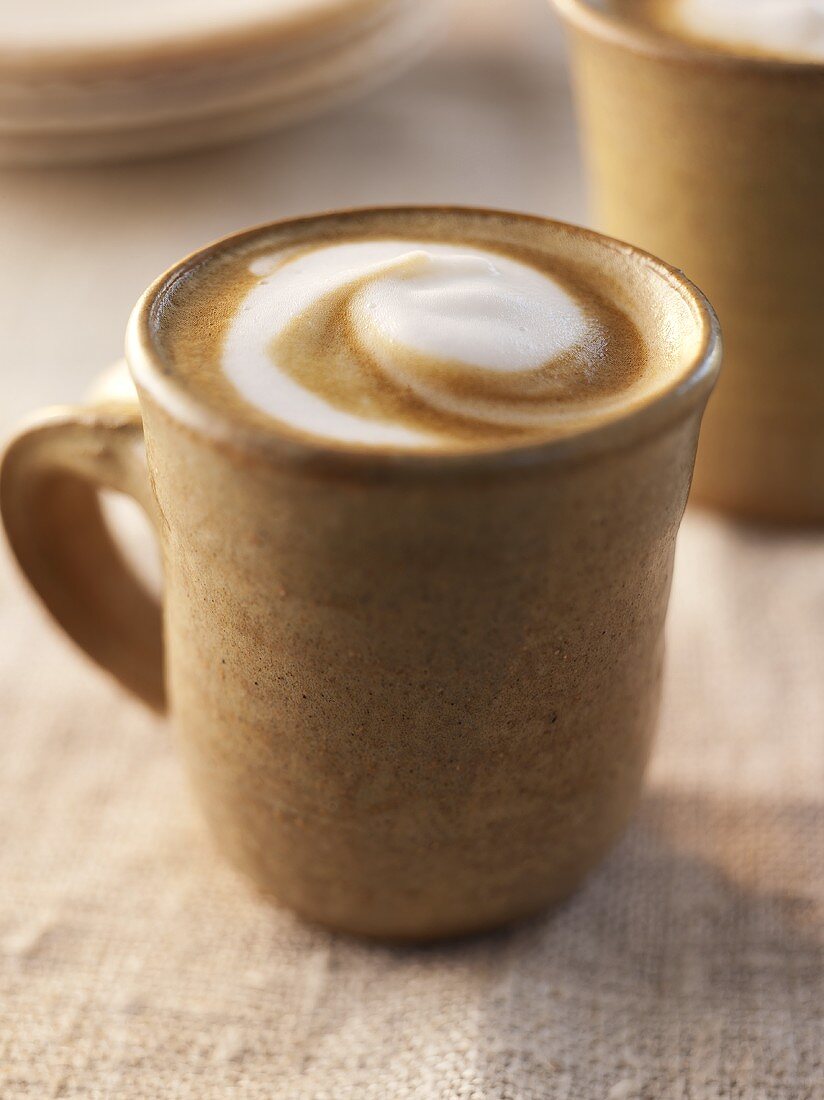 Latte in Ceramic Mug with Swirled Foam