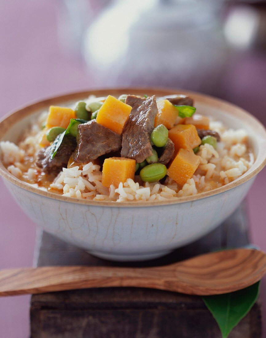 Red Curry Beef and Vegetables Over Rice; In a Bowl