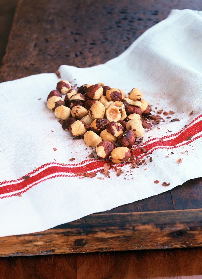 Whole Peeled Hazelnuts on a Dish Towel