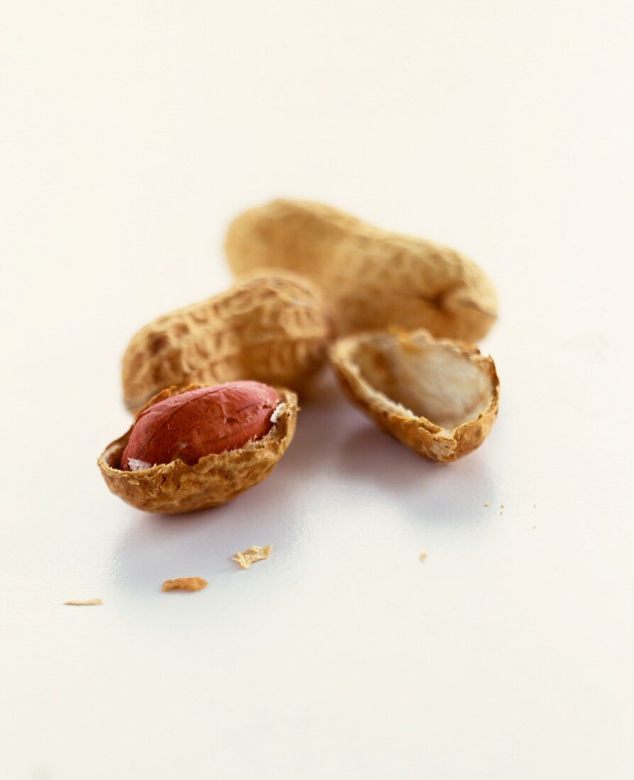 Peanuts, with intact and opened shell