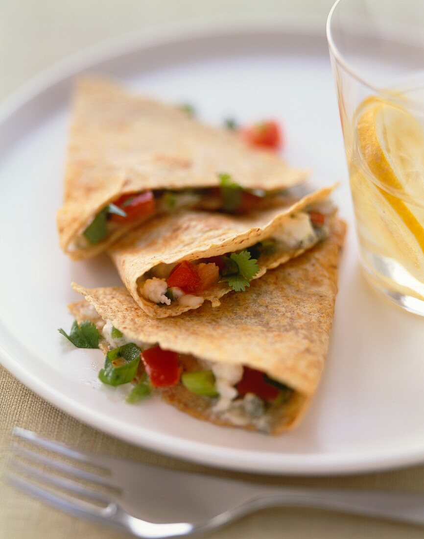 Cheese and Veggie Quesadillas on a White Plate