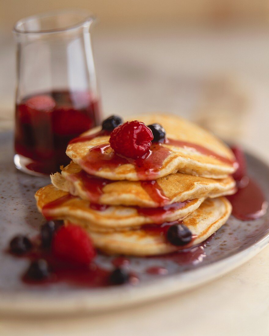 Stack of Multi-Grain Pancakes with Fresh Berry Sauce