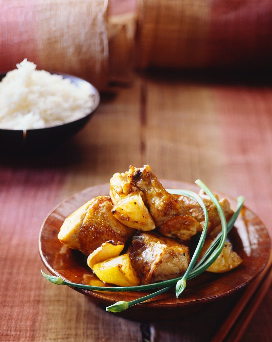 Lemon chicken with chives and rice