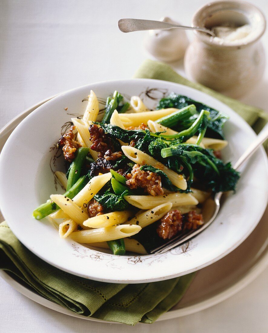 Penne alla pugliese (pasta with sausages and rapini, Italy)