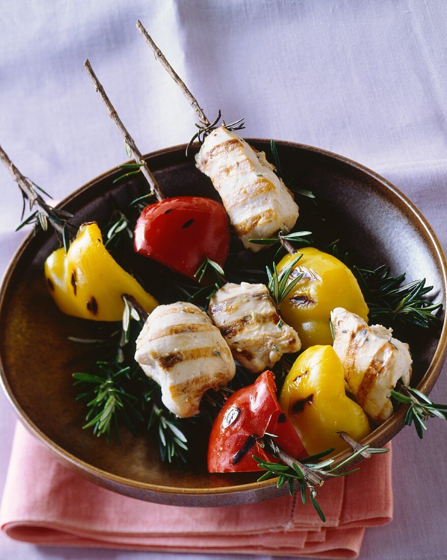 Grilled chicken kebabs with peppers and rosemary