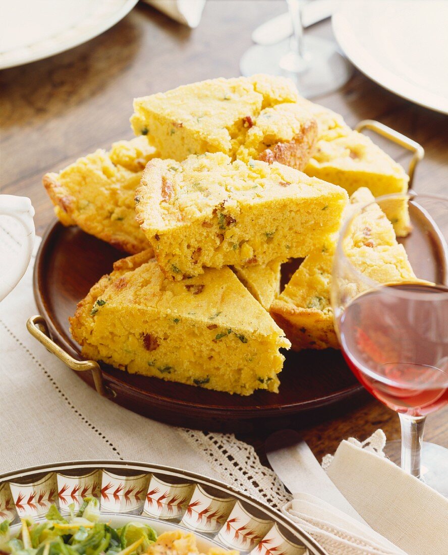 Scallion and Bacon Cornbread Wedges on a Tray