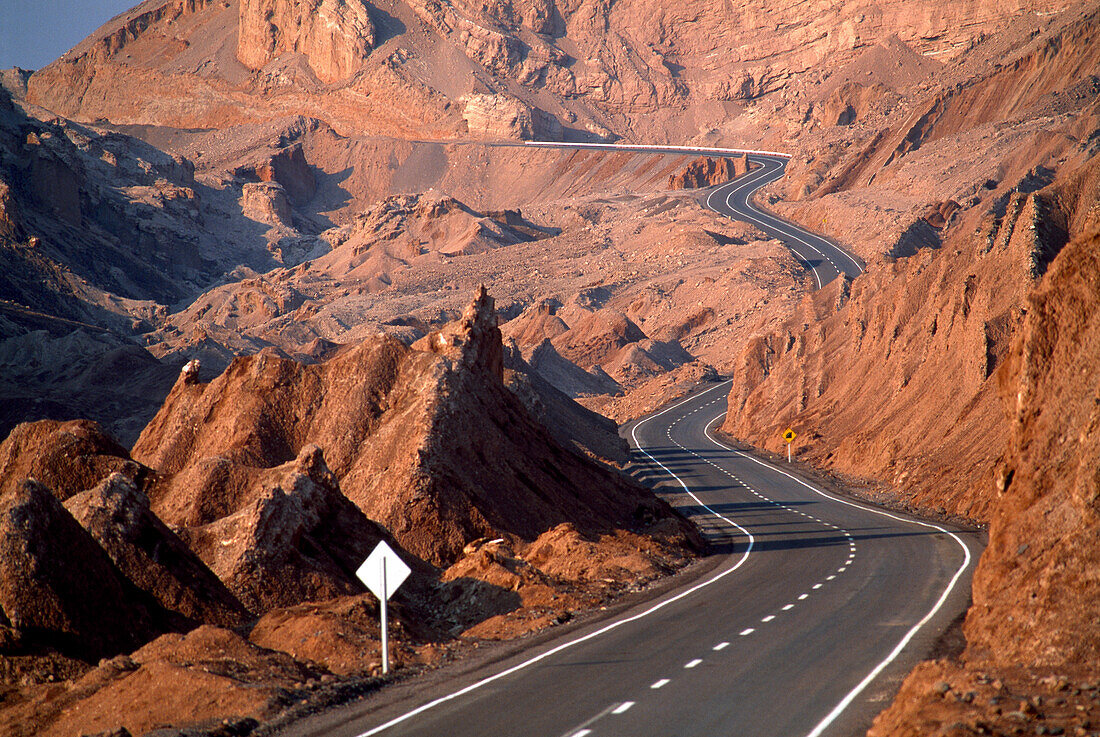 Lonesome country road in the mountains, Valle de la Luna, Atacama desert, Chile