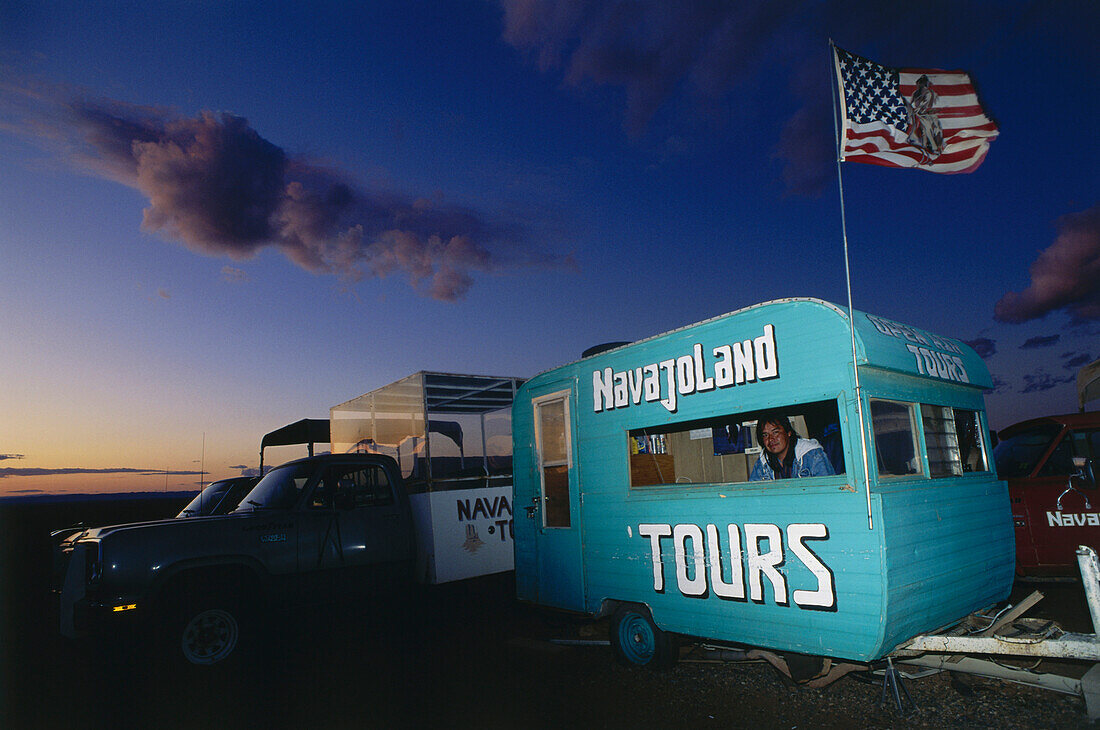 Caravan in the evening light promoting tours, Travel guide, Monument Valley, Arizona, USA