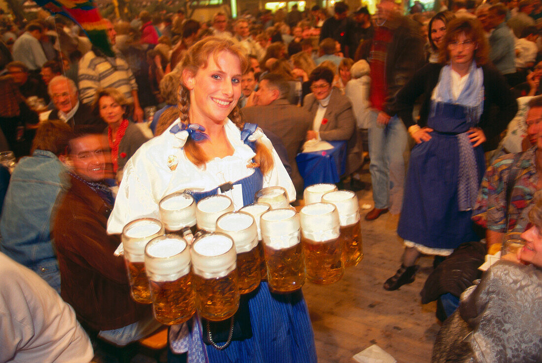 Waitress with full beer stones, Oktoberfest, Munich, Bavaria