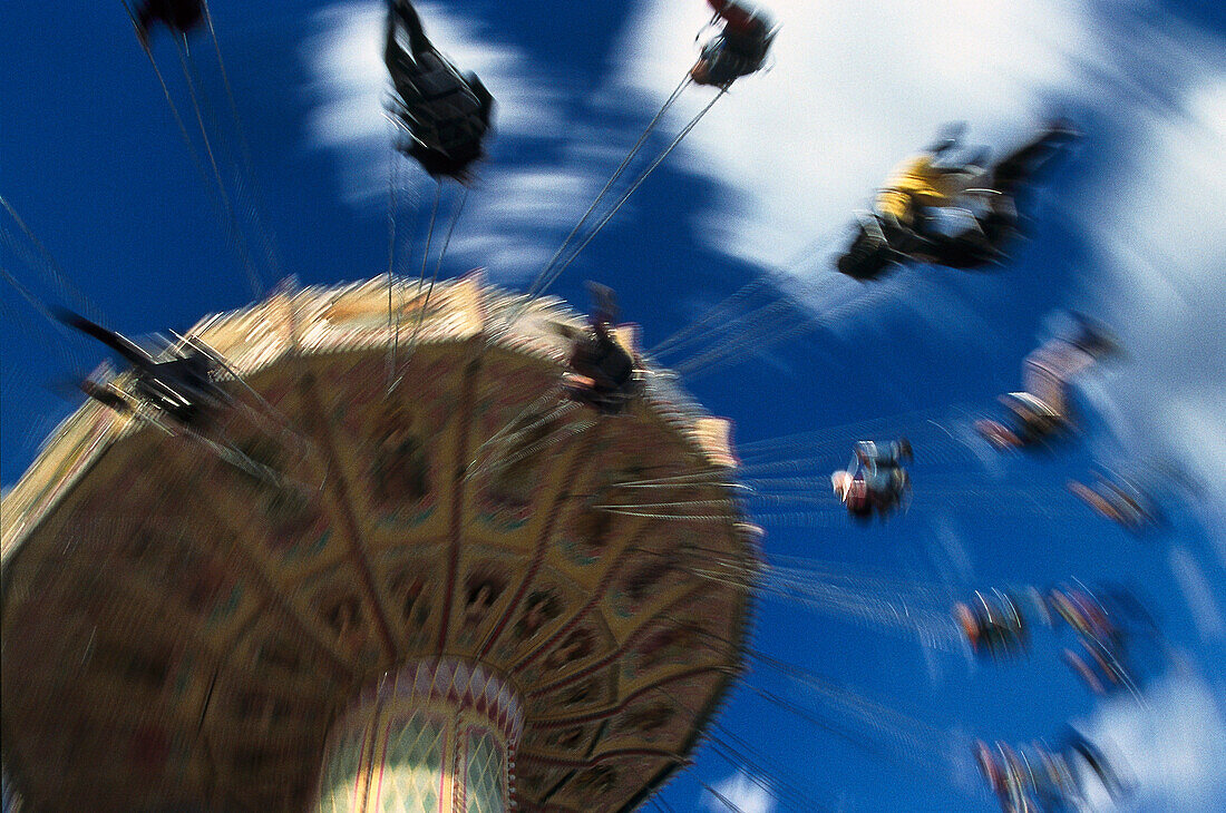 People on a chairoplane, Oktoberfest, Munich