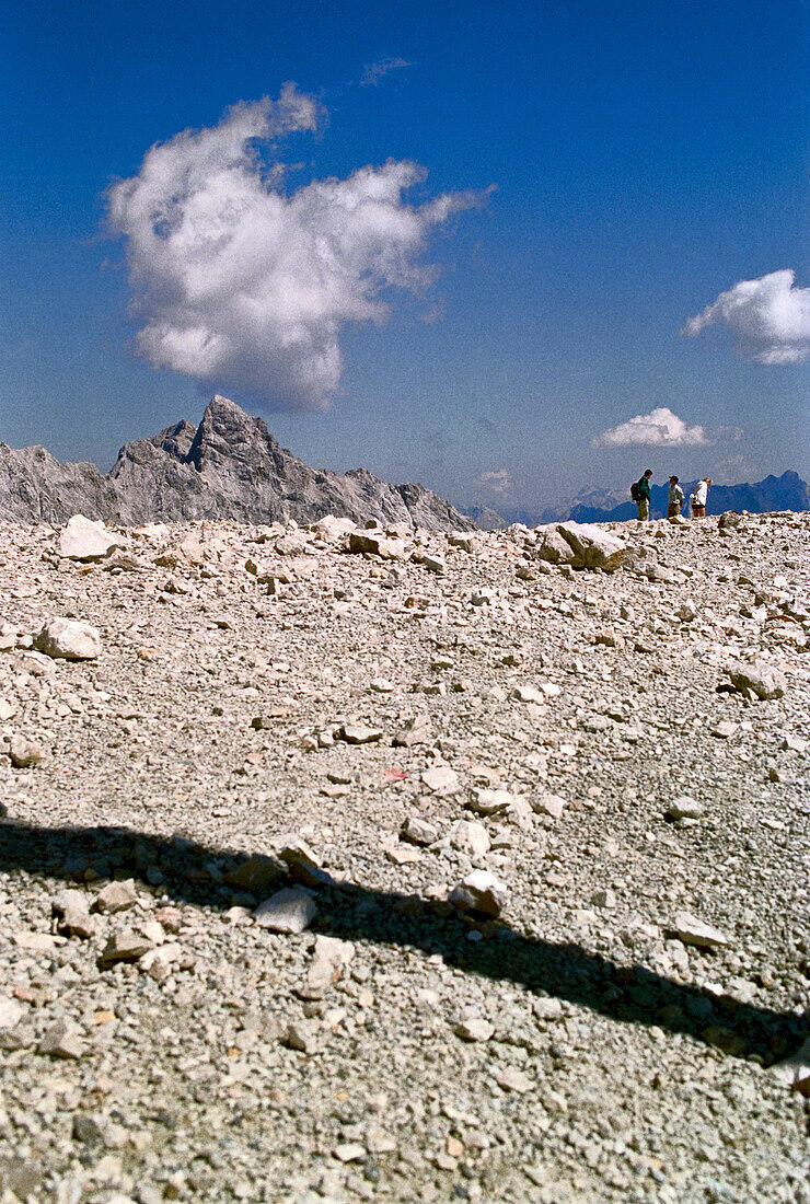 Three alpinists on Zugspitze, Bavaria, Germany