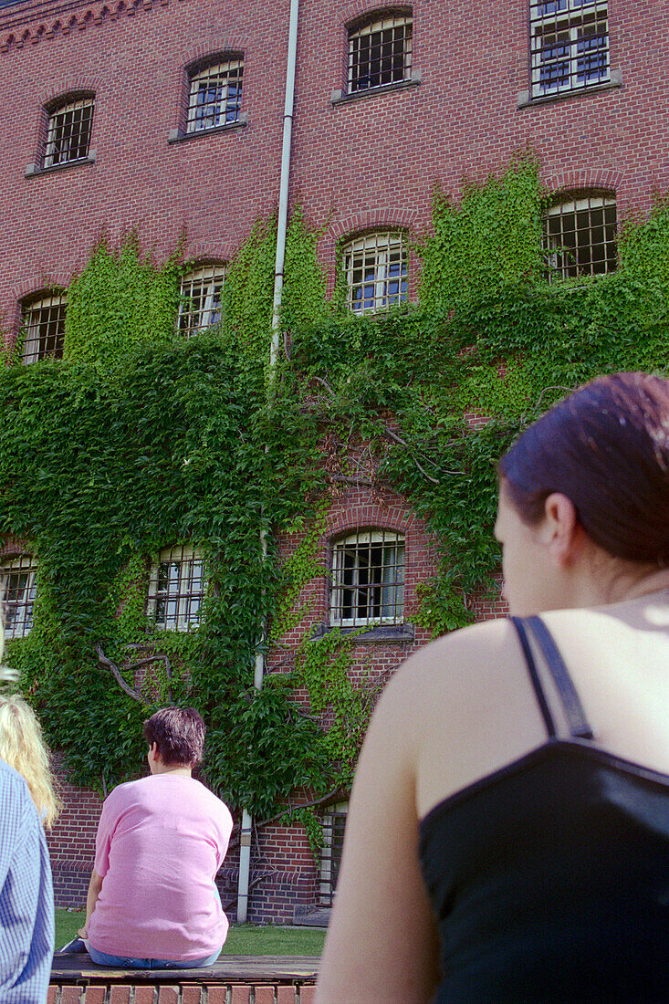 Female prisoners at daily walk in the prison yard, Germany