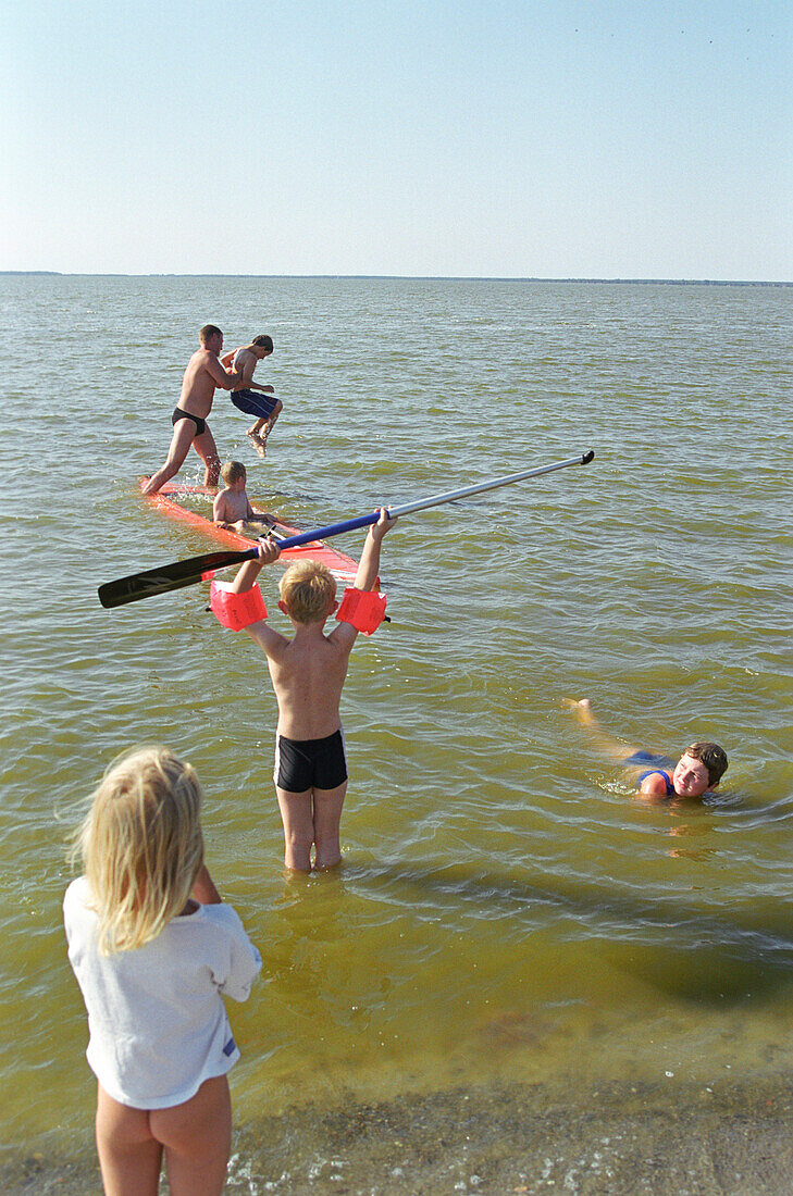 Children bathing near Neuendorf, Fischland-Darss-Zingst Mecklenburg-Western Pomerania, Germany