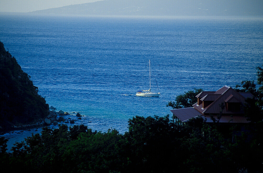 Sailing boat off shore, Iles des Saintes, Guadeloupe, Caribbean, America