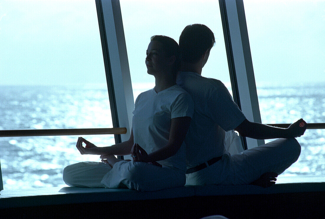Couple doing Yoga, Cruise ship AIDA, Caribbean, America