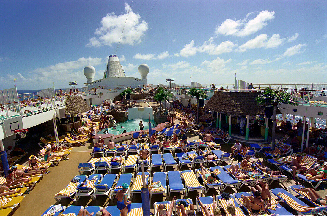 People on the sun deck, cruise ship AIDA, Caribbean, America