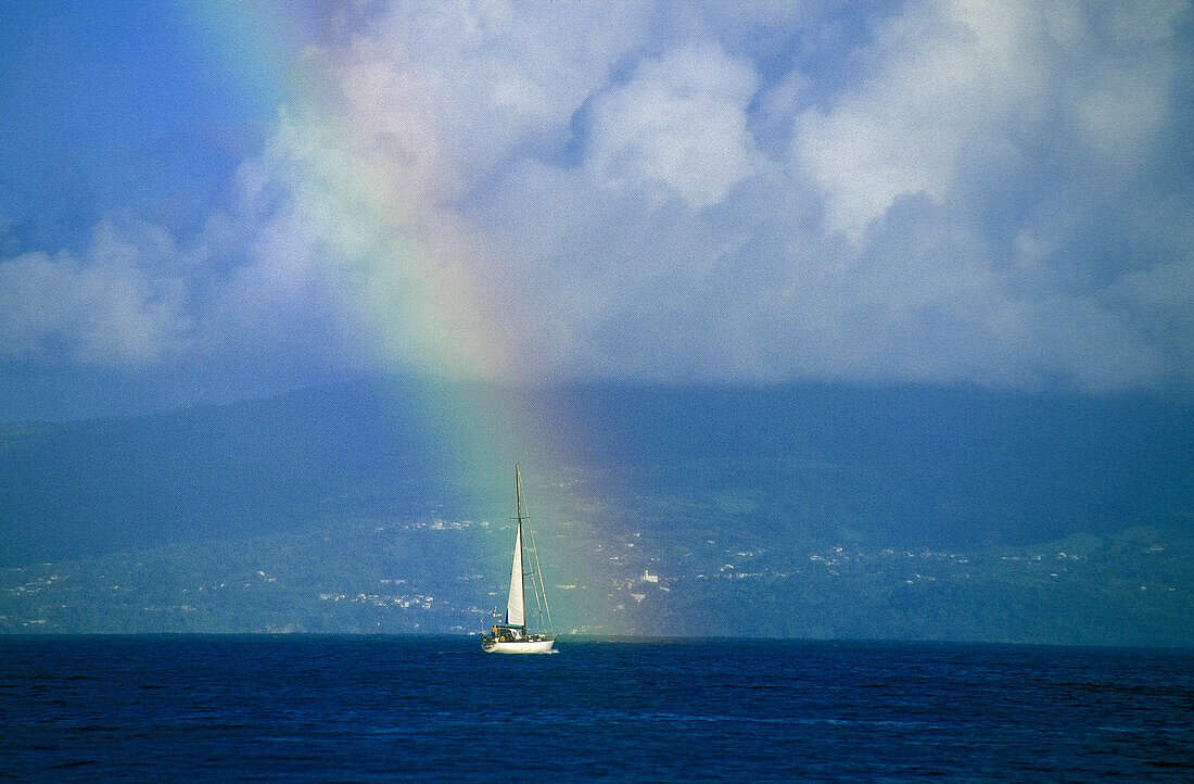 Sailing boat with rainbow, St. Kitts, St. Christopher Caribbean, America