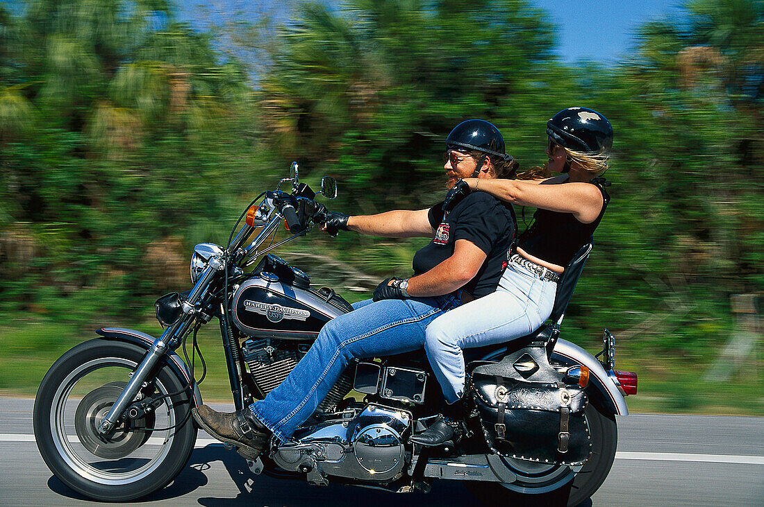 Couple on a Harley, on highway Nr. 19 close to Perry Florida, USA