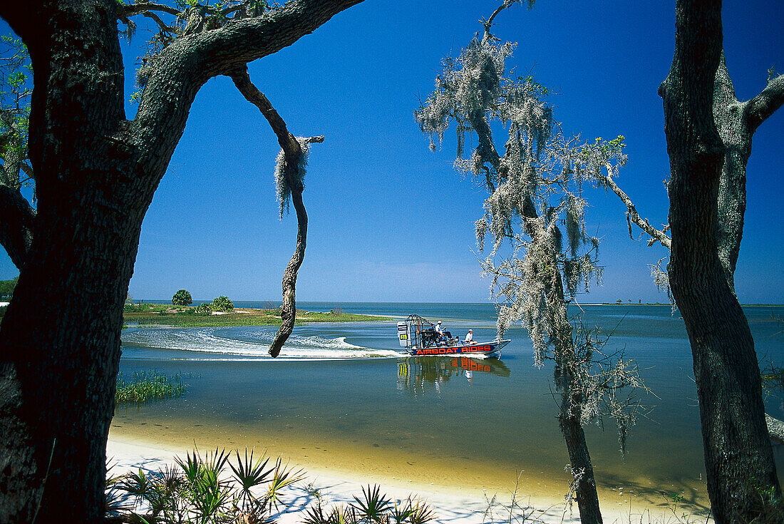 People on a boat near to the bank, Cedar Key, Florida, USA, America