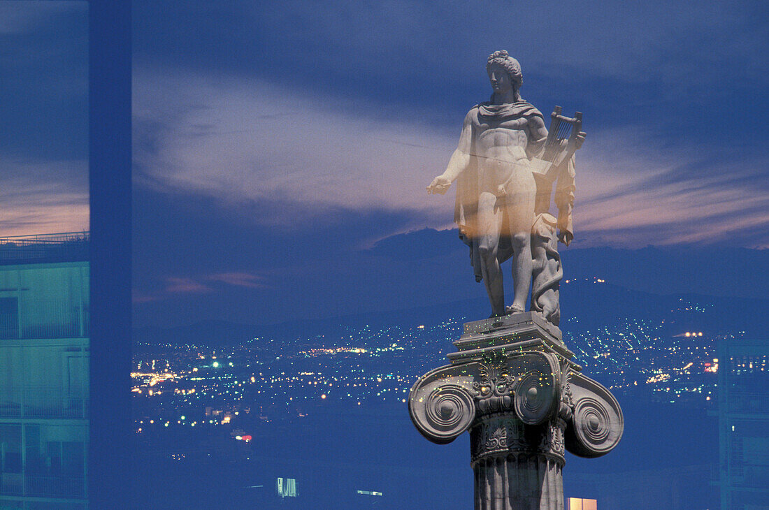 Statue on capital with cityscape, Athens, Greece