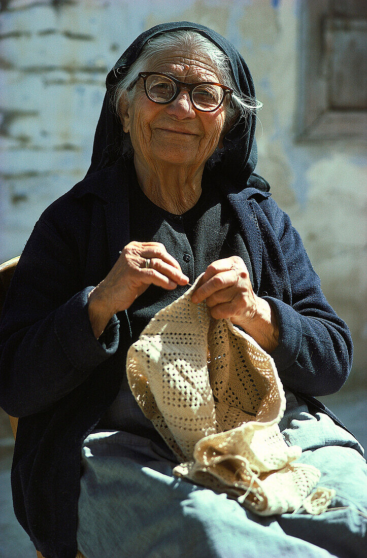 Senior woman doing handiwork, Lefkara, Cyprus