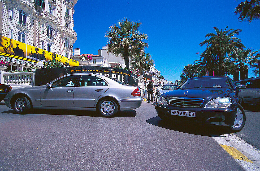 Mercedes parked in front of shops in the Boulevard de la Croisette, Cannes, Cote d'Azur, France