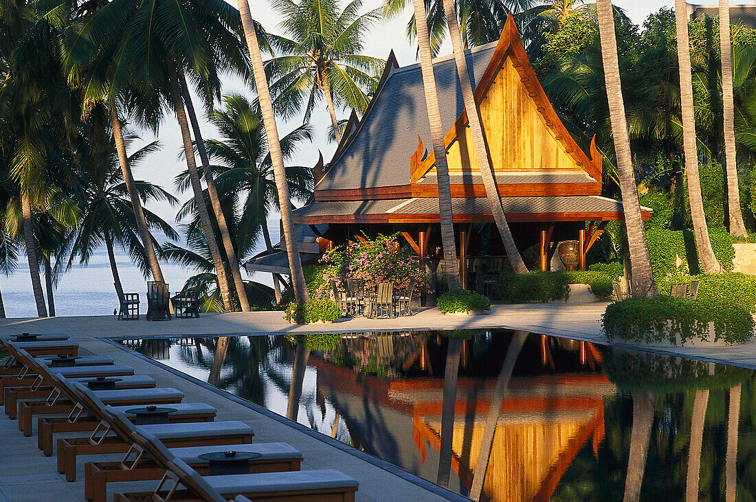 Amanpuri Hotel and pool under palm trees, Phuket, Thailand, Asia