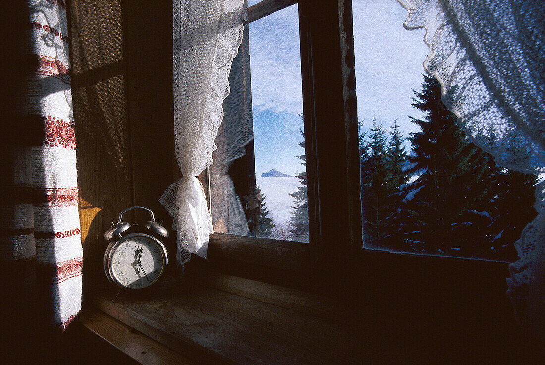 Alarm clock on a window ledge, Alpine hut, Tyrol, Austria