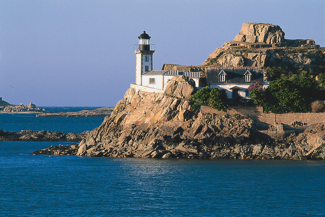 Lighthouse on a rocky island, Ile Louet, Finistere, Brittany, France, Europe